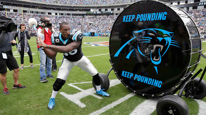 Thomas Davis pounds the Panthers’ drum.